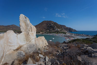 Scenic view of sea against blue sky