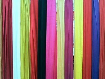 Full frame shot of colorful scarves hanging at market for sale