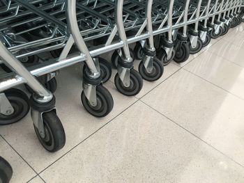 High angle view of bicycles on tiled floor