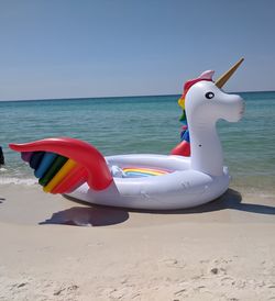 Unicorn float on the beach