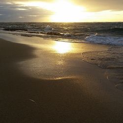 Scenic view of sea at sunset