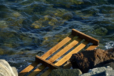 High angle view of wooden ramp at sea shore