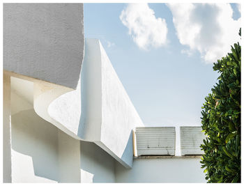 Low angle view of white building against sky