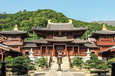 Temple outside building against clear sky