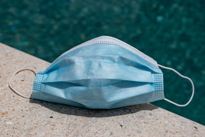 High angle view of shoes on stone
