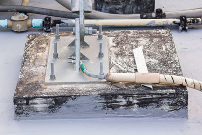 High angle view of pipes on water