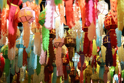 Full frame shot of multi colored decorations hanging at market