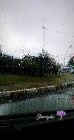 Wet glass window in rainy season