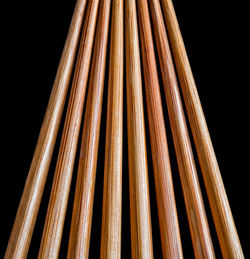 Close-up of chopsticks on black background