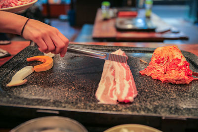 Close-up of person preparing food