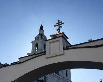 Low angle view of building against clear blue sky