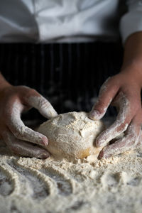 Midsection of person preparing food