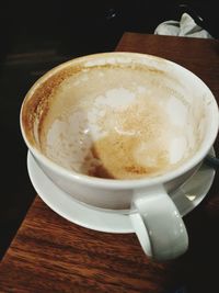 High angle view of cappuccino on table