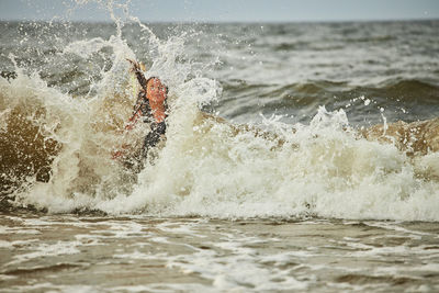 Close-up of water splashing in sea