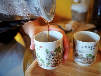 Close-up of coffee cup on table
