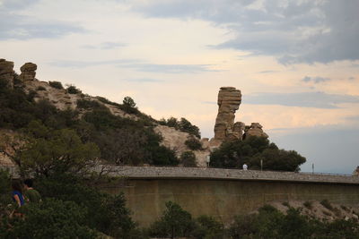 Built structure against cloudy sky