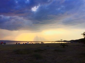 Scenic view of sea against cloudy sky