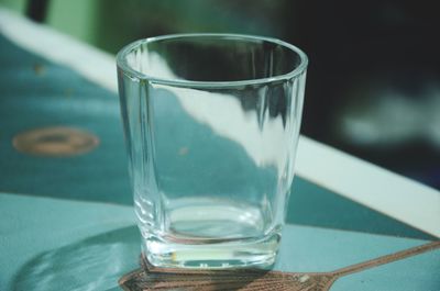 Close-up of drinking glass on table