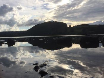 Reflection of sky on silhouette water