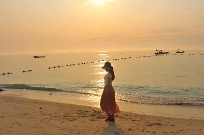 Scenic view of sea at sunset