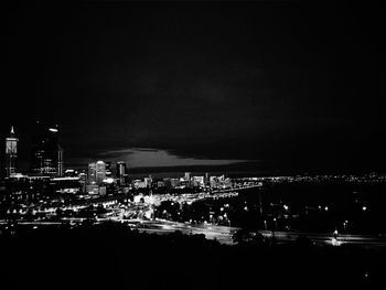 Illuminated cityscape at night