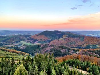 Scenic view of landscape against sky during sunset