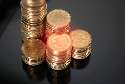 High angle view of coins on table