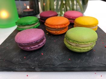 Close-up of multi colored candies on table