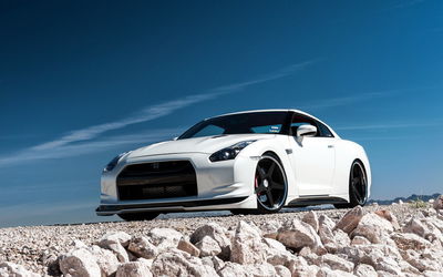 Low angle view of car against blue sky