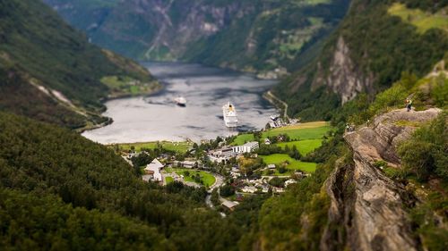 High angle view of buildings by mountain