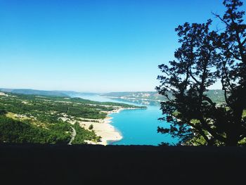 Scenic view of landscape against clear blue sky