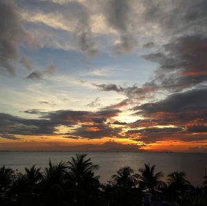 Scenic view of sea against sky at sunset