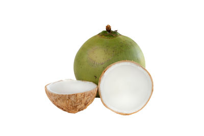 Close-up of fruits against white background