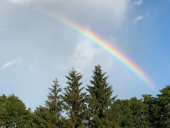 Low angle view of rainbow against sky