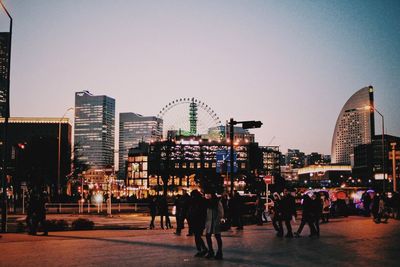 People looking at city skyline