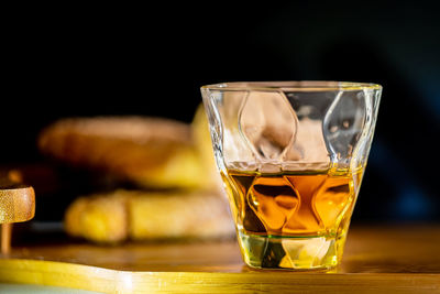 Close-up of beer in glass on table