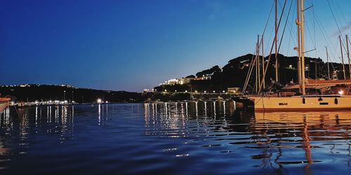 View of harbor at night