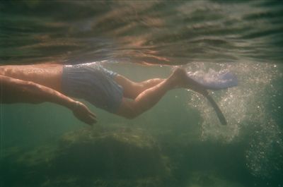 Man swimming in sea