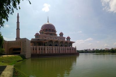 View of temple against cloudy sky