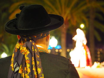 Close-up of illuminated statue against blurred background