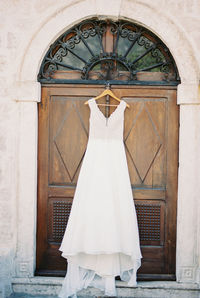 Low section of woman standing in church