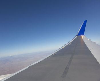 Low angle view of airplane wing