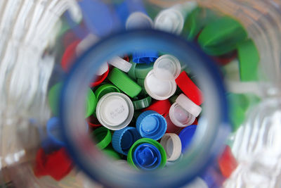 Directly above shot of multi colored bottle caps