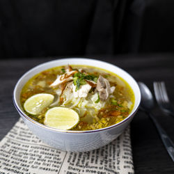 Soto ayam, indonesian food, photographed with cutlery