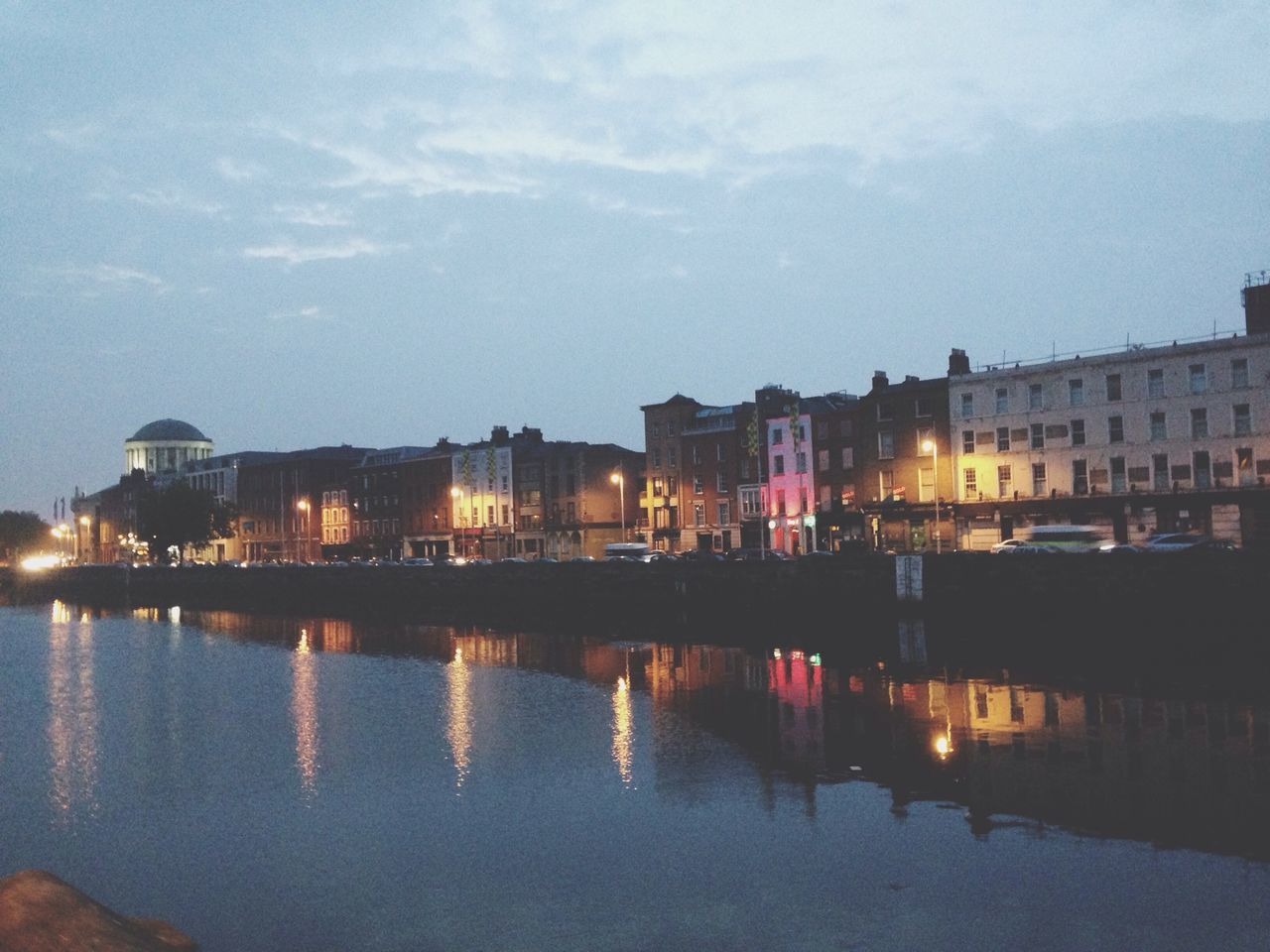 building exterior, water, architecture, illuminated, built structure, reflection, sky, waterfront, night, river, dusk, city, house, lake, cloud - sky, outdoors, residential structure, residential building, building, no people