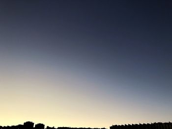 Scenic view of silhouette landscape against clear sky