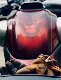 Close-up of gloves on motorcycle