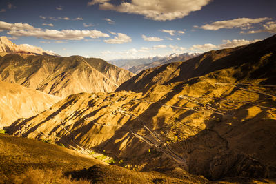 Road winding through mountain in tibet china.