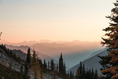 Scenic view of mountains against sky during sunset