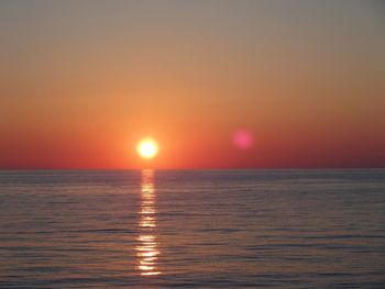 Scenic view of sunset over sea